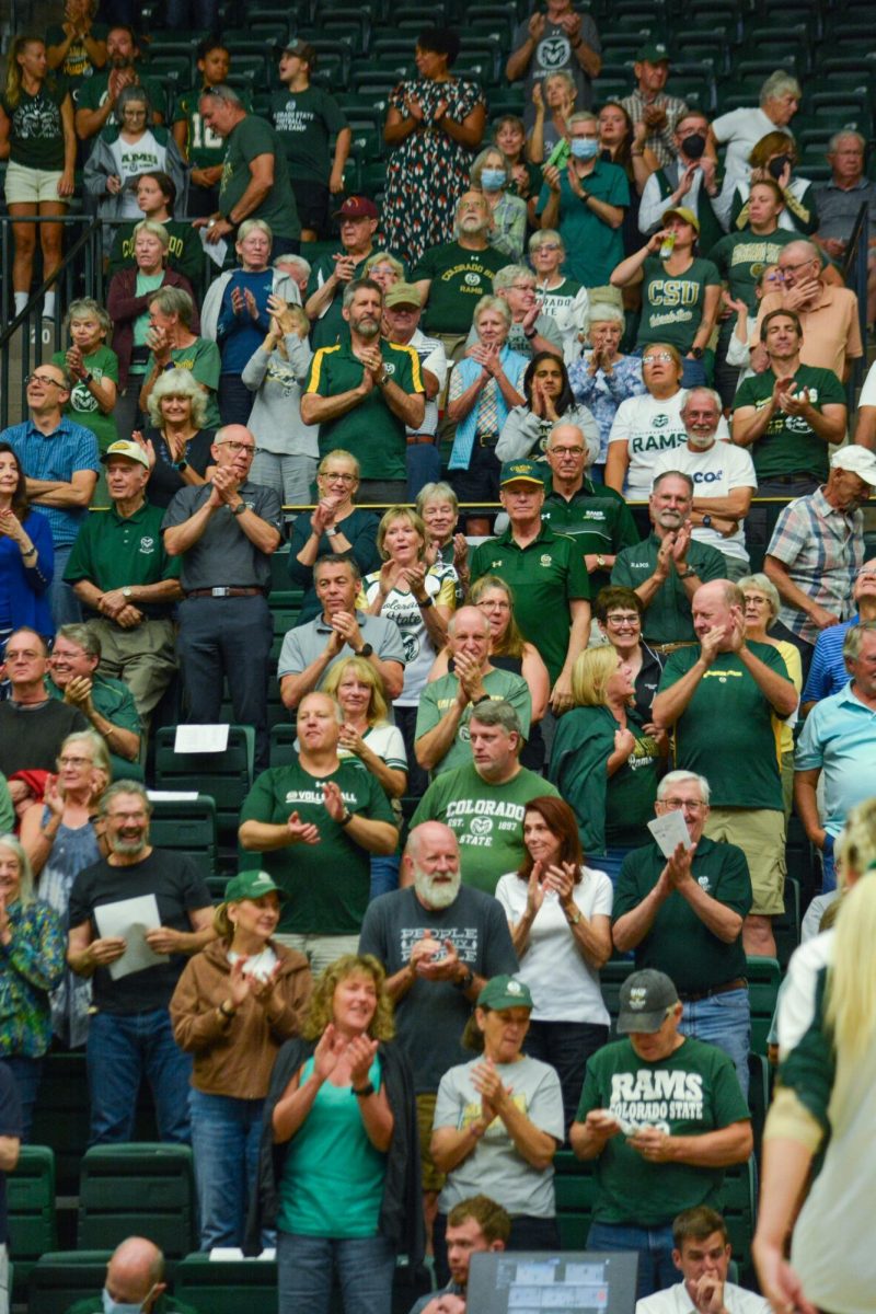 Colorado State University fans stand for the final point of a match Sep. 7. CSU beat opponent Bowling Green State University 3-2 in a very close game.
