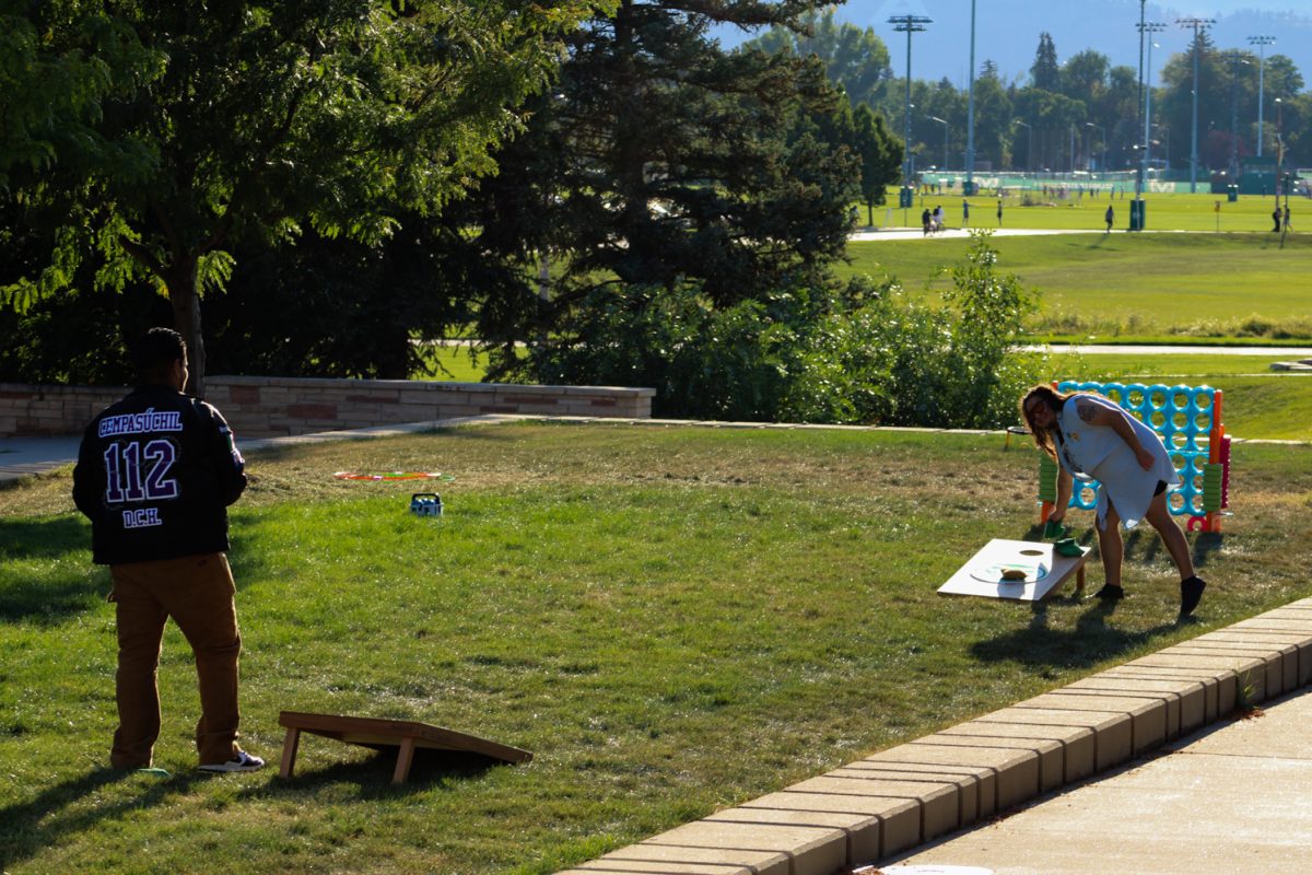 Colorado State University students play various games such as bean bag toss during the National Latinx Heritage Month launch hosted by El Centro at the Sutherland Garden Sept. 13. Games, dancing and information booths provided a resource to learning more about the Latinx culture and providing a friendly environment open to all. 