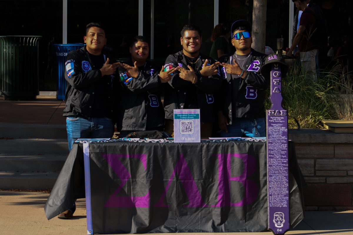 Latino fraternity Sigma Lambda Beta International Fraternity Incorporated represents their brotherhood at the National Latinx Heritage Month launch by El Centro at Colorado State University Sept. 13. To learn more about their frat, they featured the long line of the group’s founding fathers, incorporating the claim of being “The most honorable lines of the mighty Iota Empire.” to prove that  it is a worthy frat for the Latino community to join. 