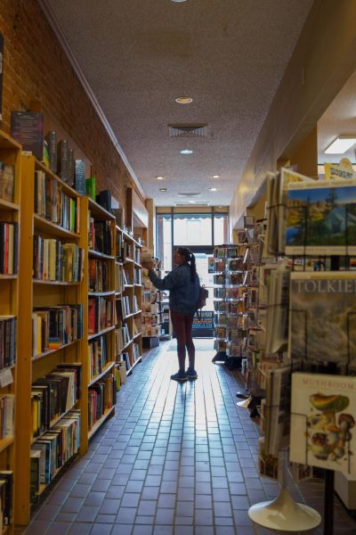 A guest in the store browses the shelves of Old Firehouse Books in Old Town Fort Collins Sept. 15.