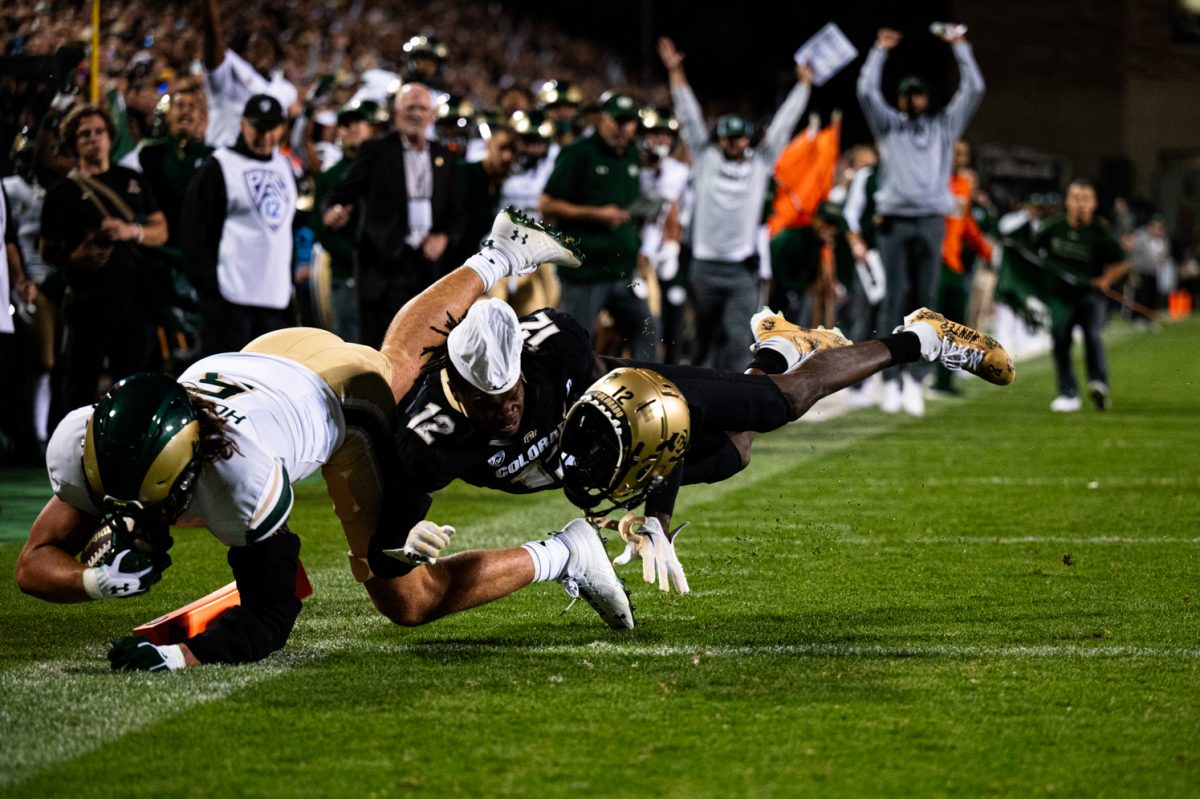 Colorado State University tight end Dallin Holker (5) dives for the end zone during the Rocky Mountain Showdown against the University of Colorado Boulder Sept. 16. CU won 43-35.