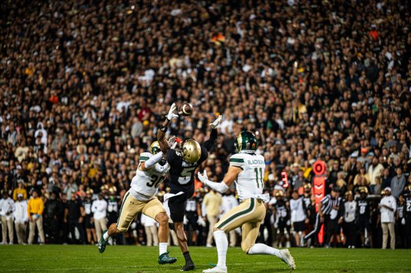 University of Colorado Boulder Buffaloes player  Jimmy Horn Jr. (5) jumps for an interception during the Rocky Mountain Showdown against Colorado State University Sept. 16. CU won 43-35.