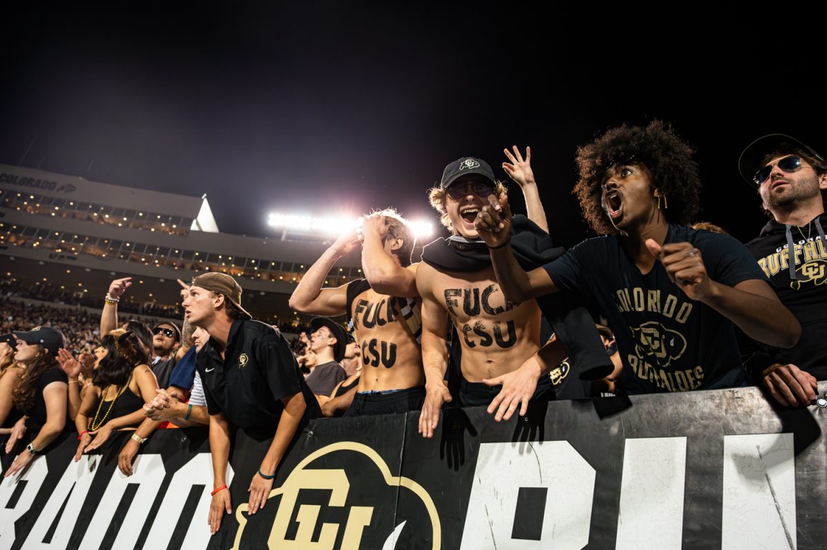 University of Colorado Boulder fans celebrate during the Rocky Mountain Showdown game against Colorado State University at Folsom Field in Boulder Sept. 16. CU won 43-35.