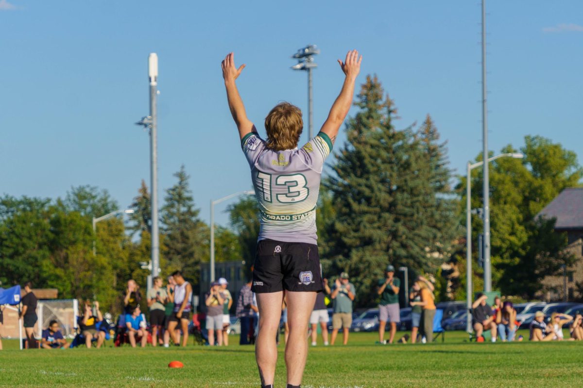 Dimitri Fabiani-Wyatt (13) of Colorado State University's Men's Rugby celebrates a try during a match against Colorado Boulder Sept. 17. CSU won 40-18.