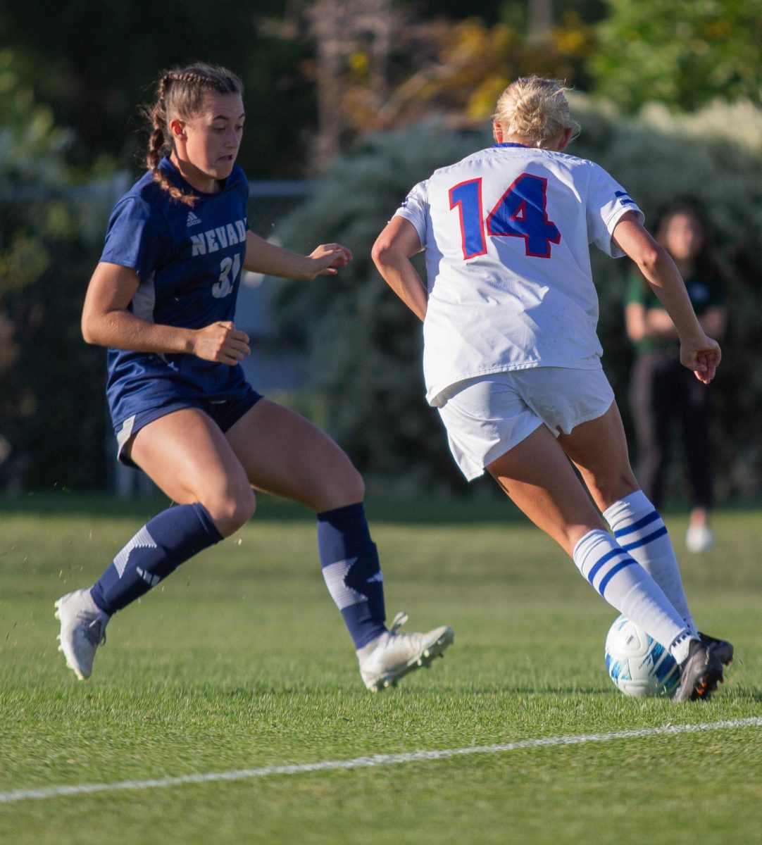 Katy Coffin (14) dribbles past University of Nevada player. Colorado State University won over Nevada with a final score of 2-1 on September 21.