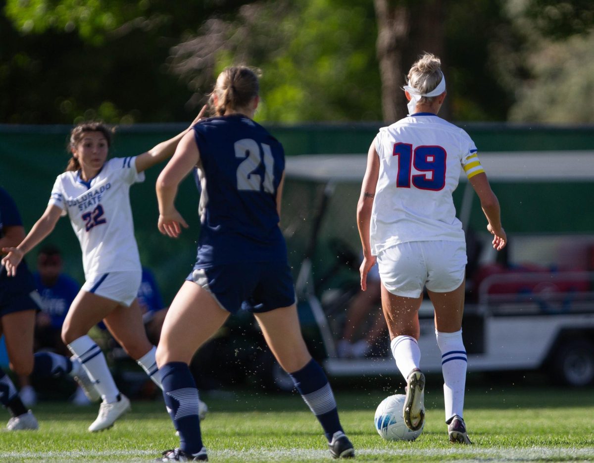 Team Captain, Halle Otto (19), dribbles the ball to find open teammate, Mia Casey (22). Colorado State University won over Nevada with a final score of 2-1 on September 21.
