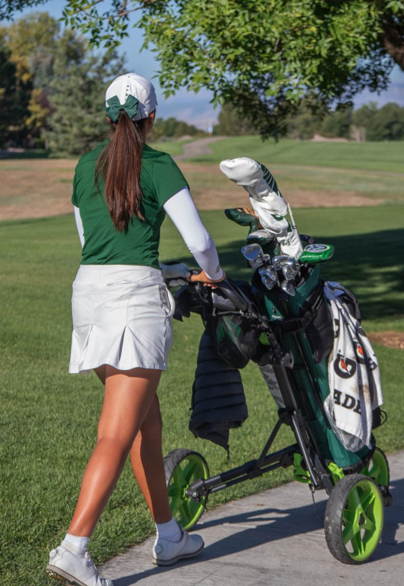 Sofia Torres walking to her ball after starting it off at hole one for the Colorado State Womens Golf team on September 25.