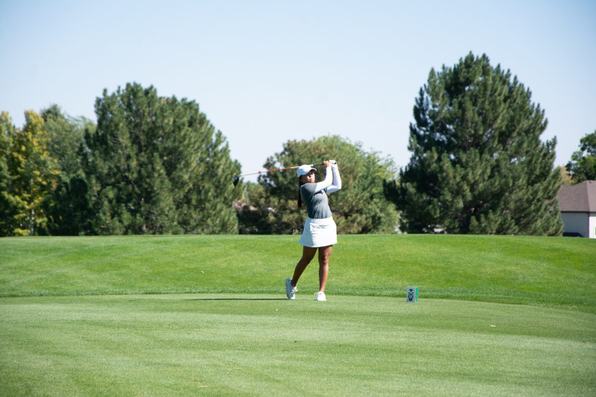 Colorado+State+womens+golf+player+Kara+Kaneshiro+looks+at+her+ball+in+the+air+at+the+Ptarmigan+Country+Club+Sept+25.