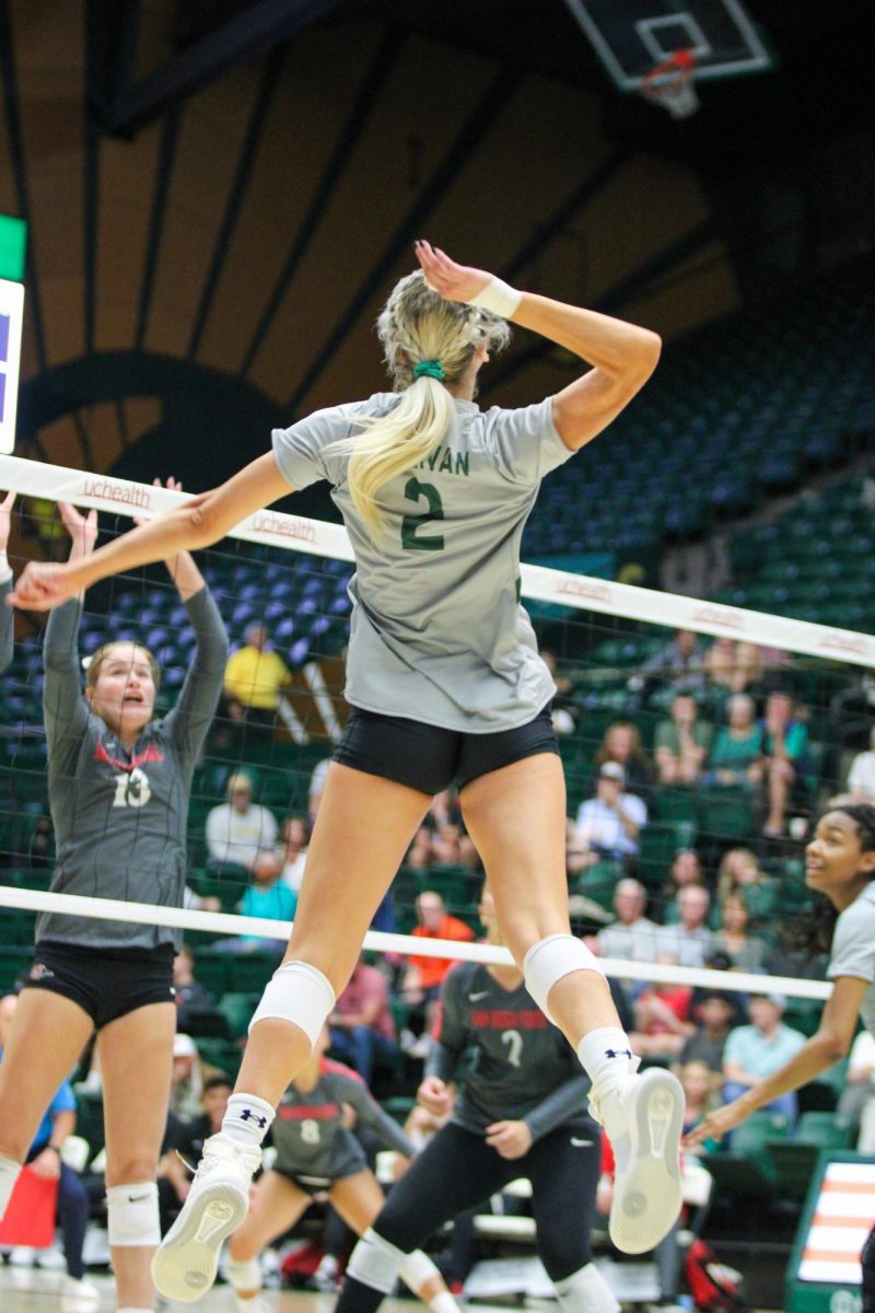 Outside hitter for Colorado State University Annie Sullivan (2) spikes the ball down on San Diego State University Sept. 28 Sullivan was the third highest scorer for CSU with a total of 13.5 points.