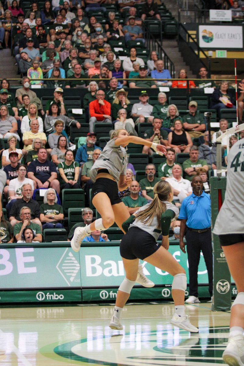 Annie Sullivan (2), outside hitter, spikes the ball down onto San Diego State University Sept. 28. Sullivan had the highest number of total attempts by any Colorado State University player with 40 over the course of the game.