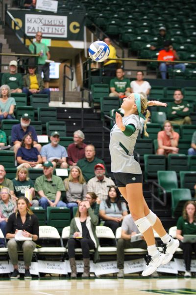 Defensive specialist Ruby Kayser (49) serves the ball to the San Diego State University players Sept. 28.