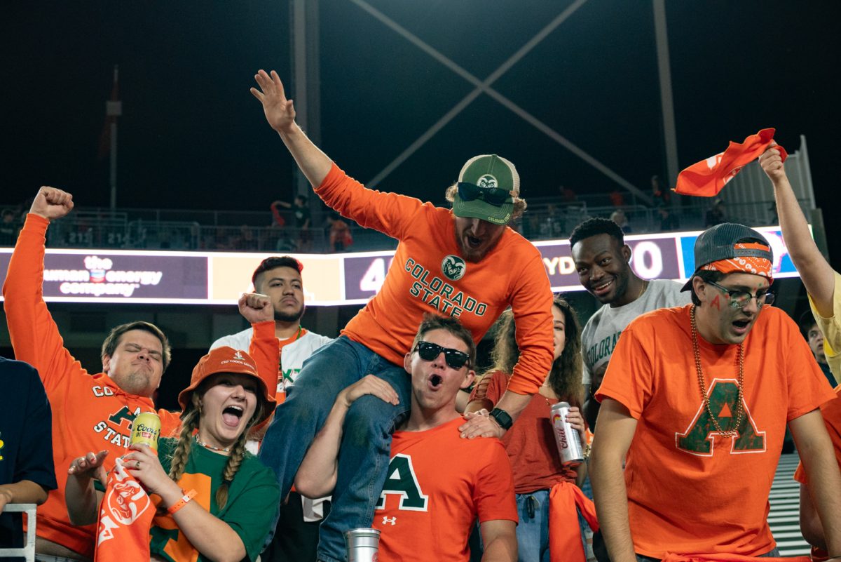 Colorado State University students cheer on their football players as they face off against the Utah Tech Trailblazers.
