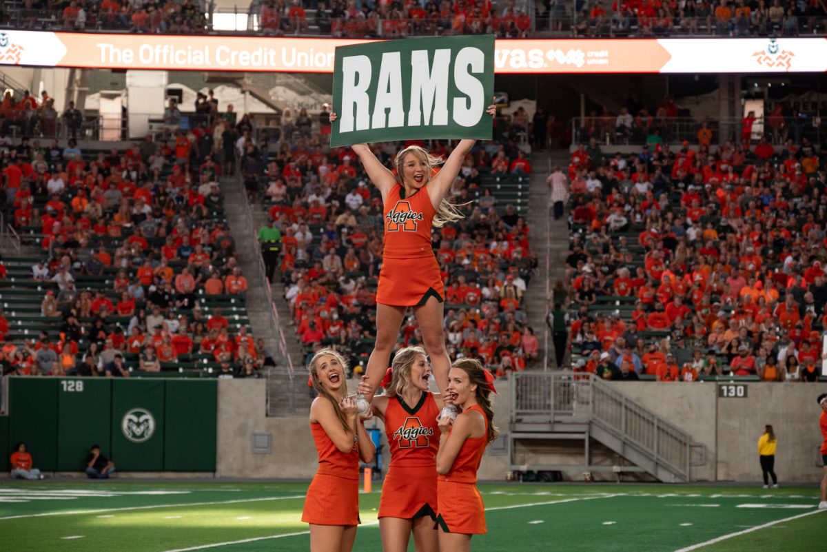 Colorado State University’s cheer team keeps the crowd loud in between plays.