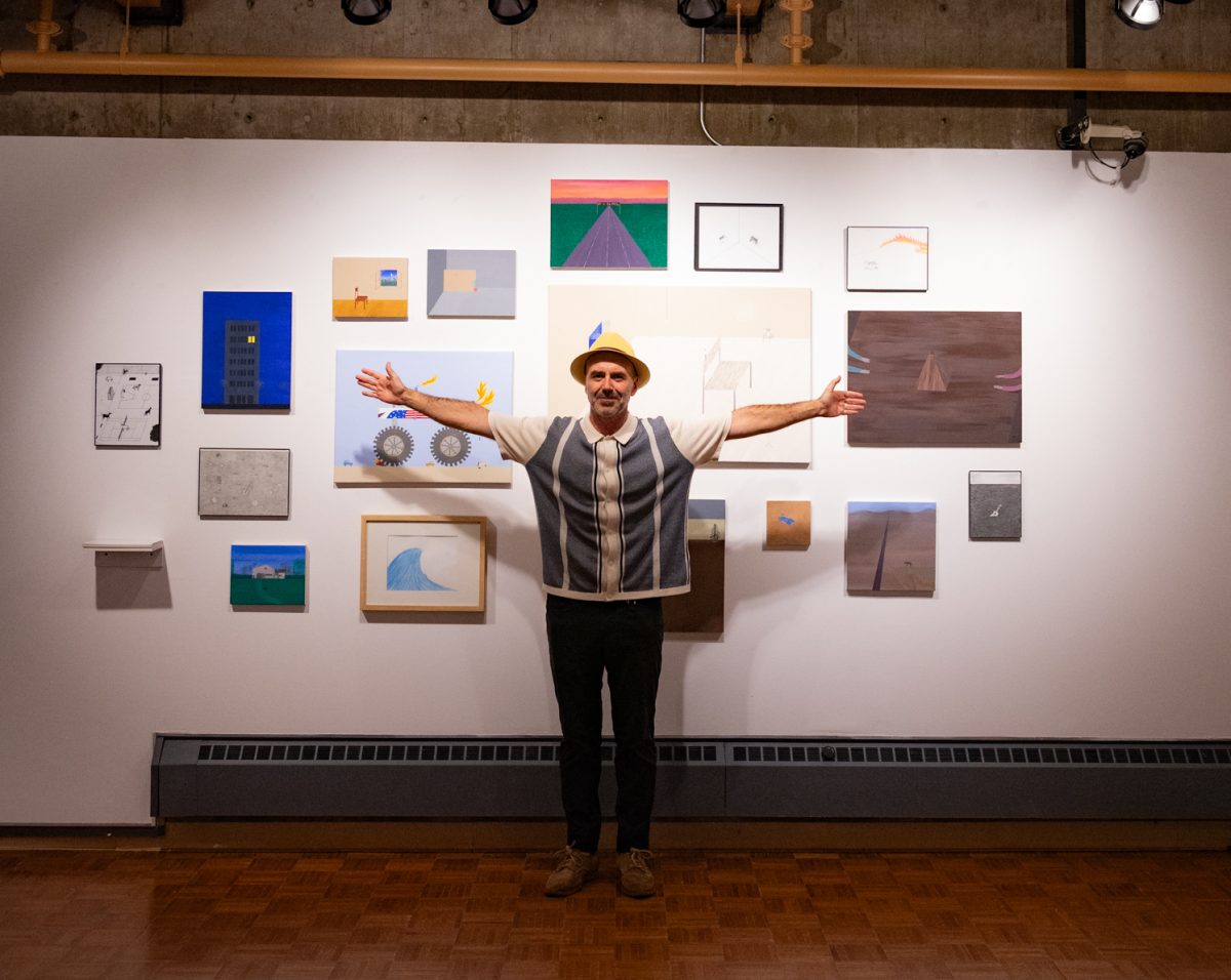 Aitor Lajarin-Encina, a painting instructor at Colorado State University, shows off a large collection of his paintings on display at the Directions Gallery.