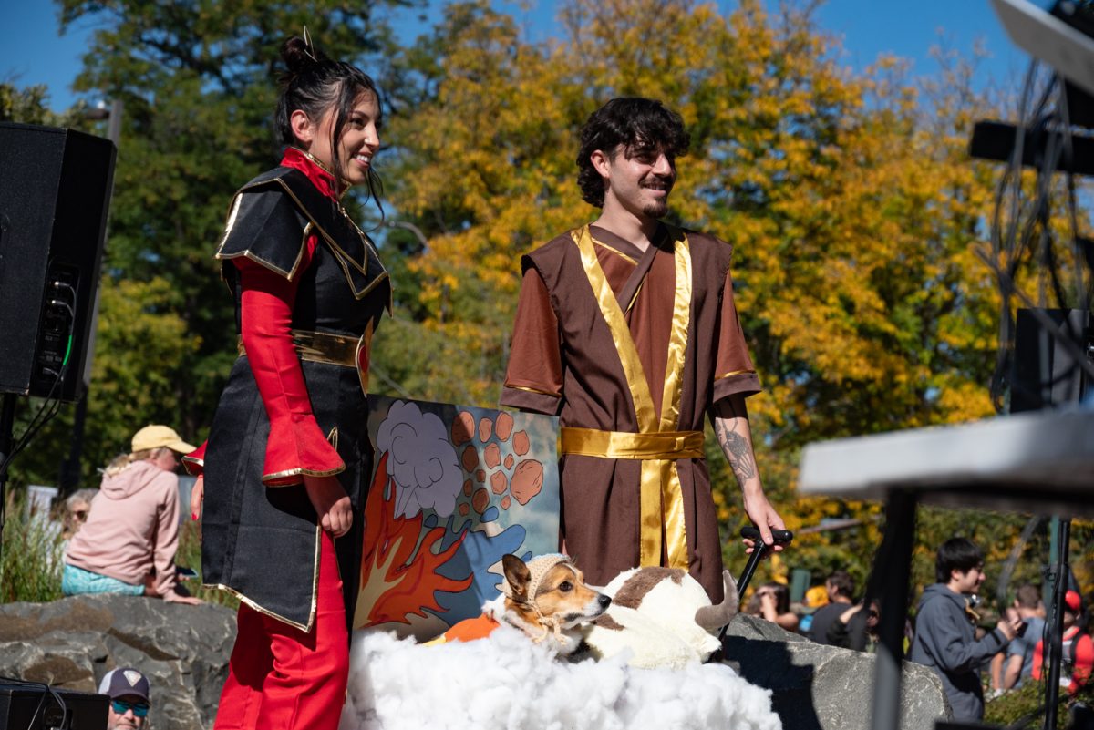 Dressed as Azula, Zuko, and Aang from Avatar: The Last Airbender, these contestants stand for the judges of the Tour de Corgi costume contest.