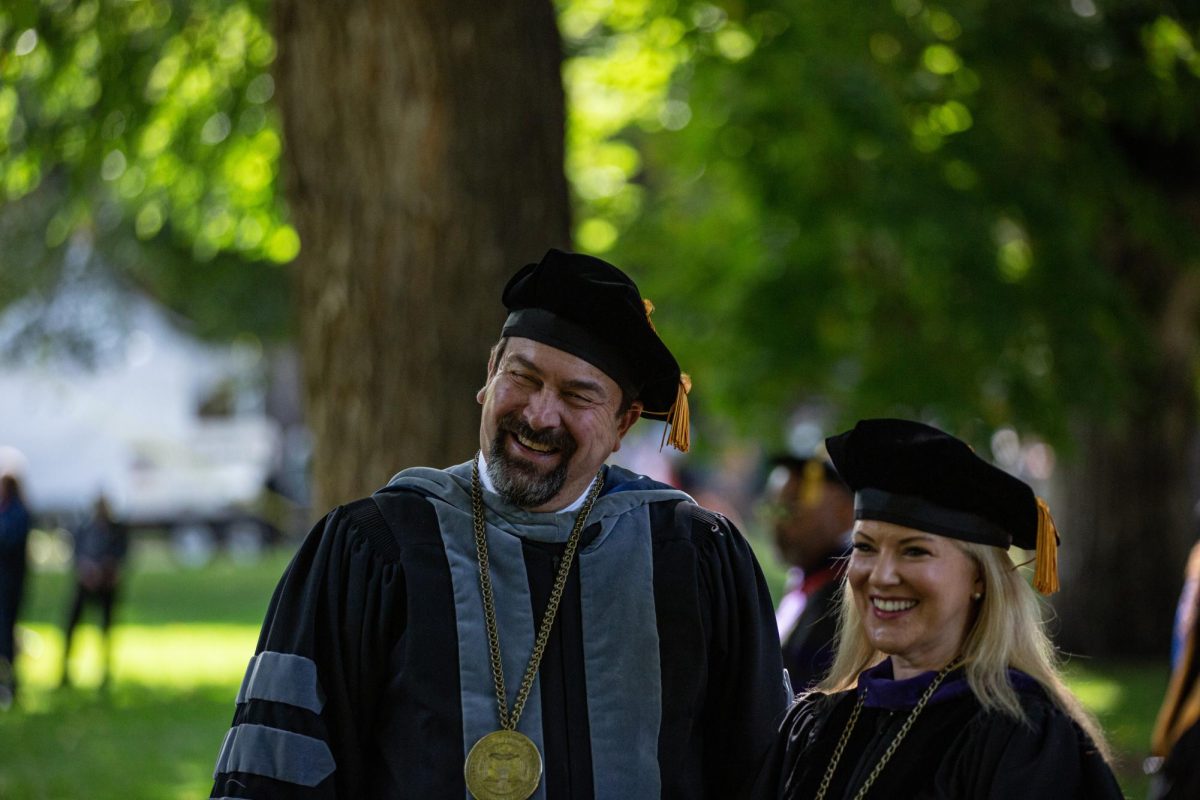 Colorado State University System Chancellor Tony Frank (left) and President Amy Parsons (right) share a moment after President Parsons investiture Oct. 4. President Parsons will serve as the 16th president of Colorado State University.