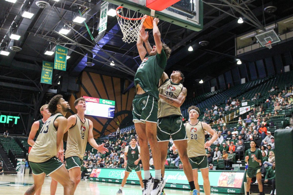 Colorado State University forward Kyle Evans (32) attempts a dunk during the CSU mens basketball scrimmage Oct. 14.