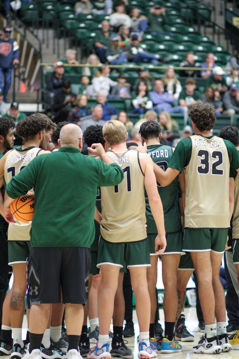 The Colorado State University mens basketball team huddles up before their scrimmage Oct. 14.