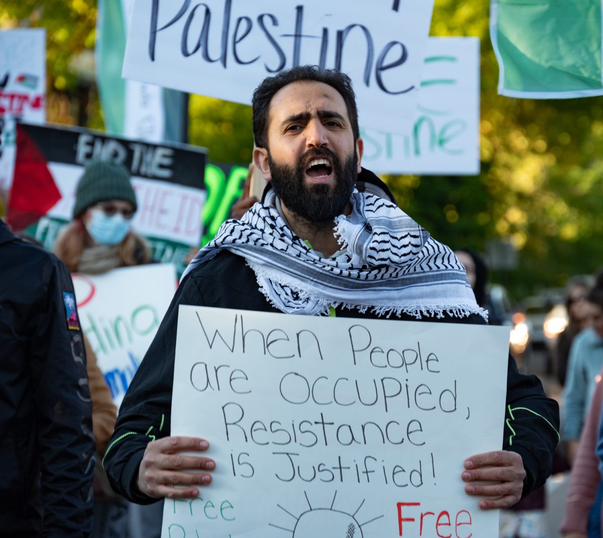 Tarek Kahala chants along with the rest of the protestors at a 'Freedom for Palestine Protest'.