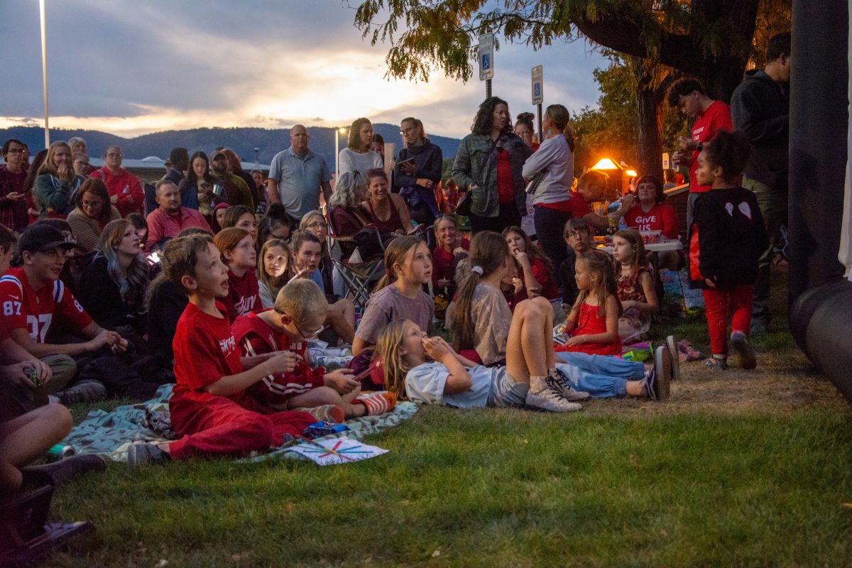 A+group+of+Poudre+School+District+students+gather+outside+the+Poudre+School+District+Information+Technology+Center+Oct.+10.+Students+and+parents+protested+the+proposed+vote+to+merge+Polaris+Expeditionary+Learning+School.+Under+the+merger%2C+younger+students+would+be+relocated+to+Olander+Elementary+School%2C+and+older+students+would+be+moved+to+Blevins+Middle+School.+