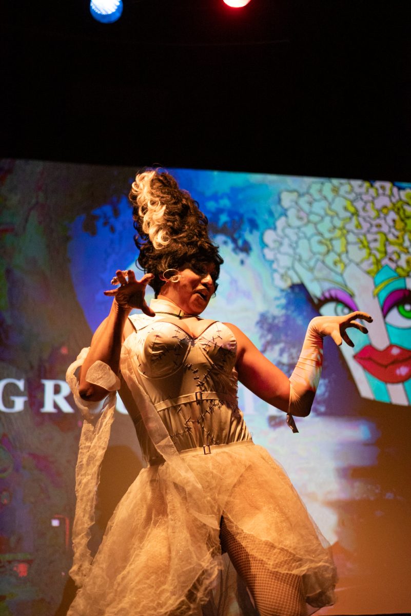 Little Sarah Tonin improvises a dance to "The Monster Mash" during Drag Roulette at the Lyric.