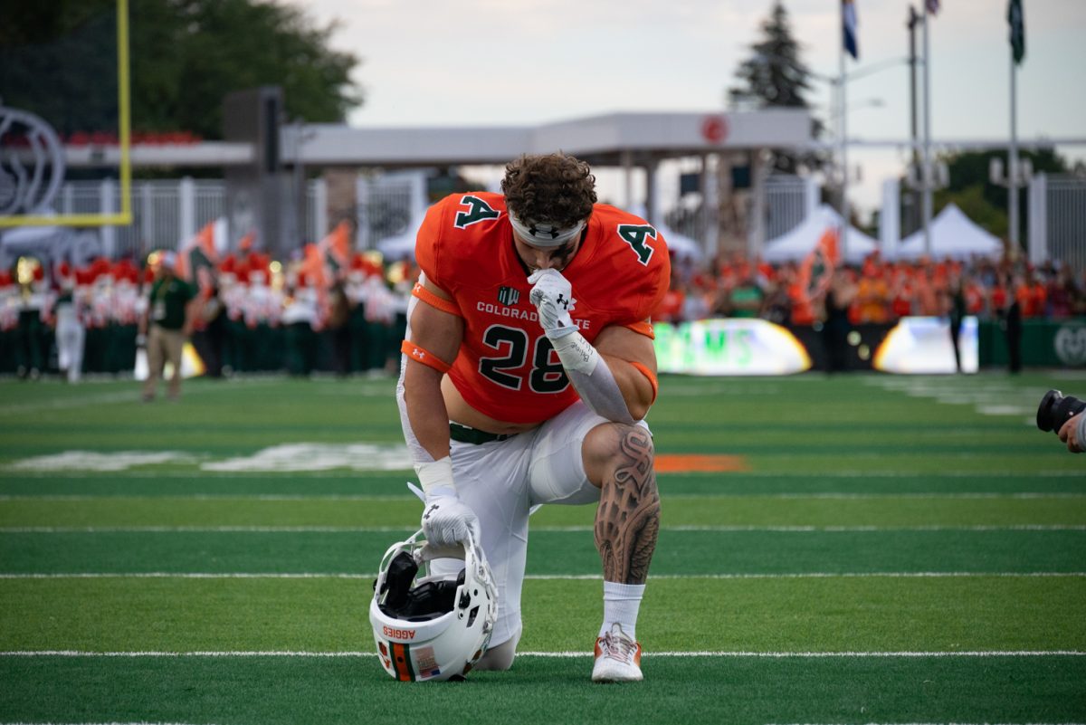 Redshirt sophomore Vann Schield (28) takes a moment before the game starts.