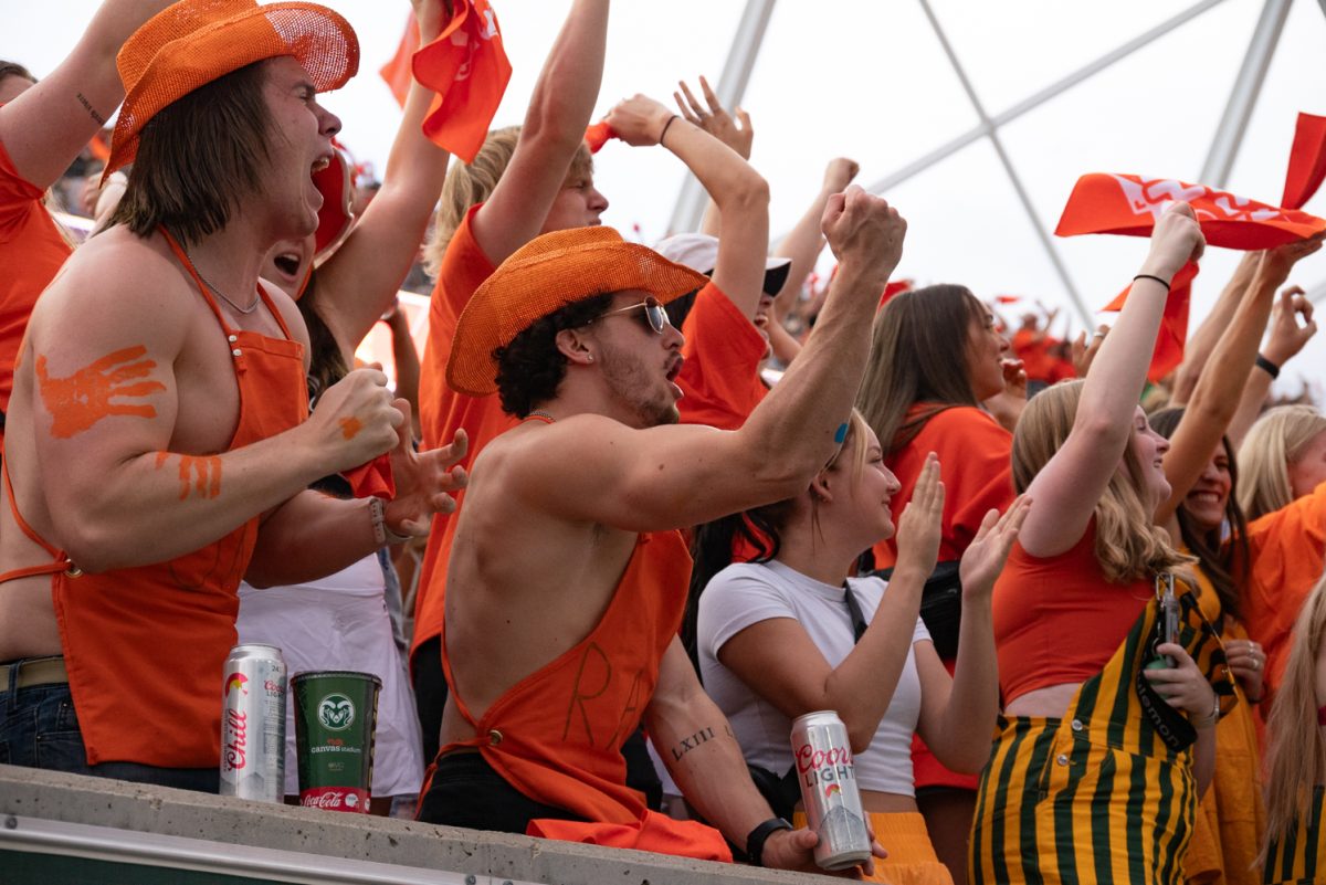 Colorado State University students cheer on their football players.