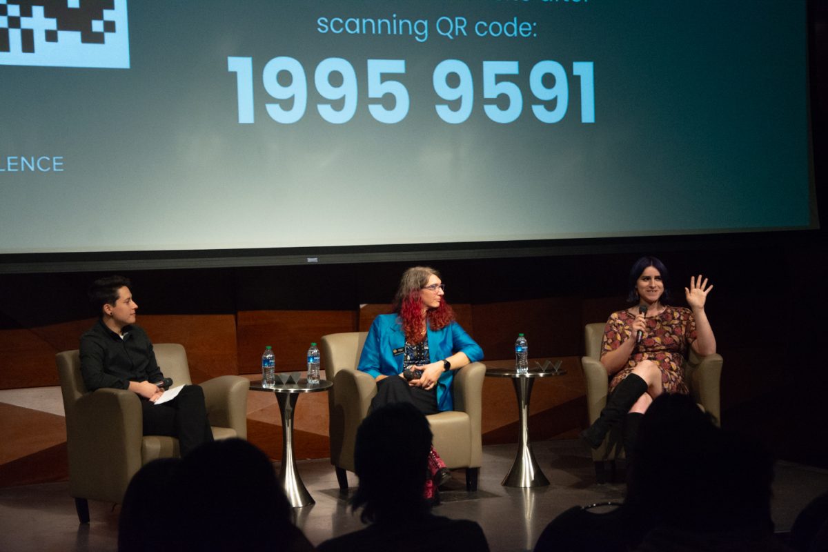 Maggie Hendrickson (L), Brianna Titone (Center), and Erin Reed (R) discuss and answer questions that the audience has during the transgender panel on Oct. 25.