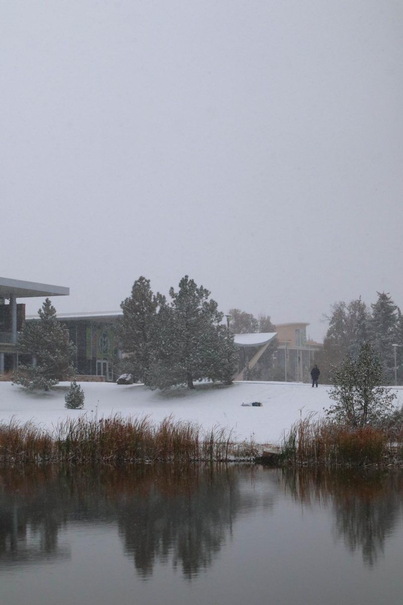Colorado State University students roll down the hill in front of the Lory Student Center, making the most of Fort Collins' first snow of the season Oct. 28. Saturday morning, Colorado State University students woke up to a sheet of white powder covering the campus. Student Angelina Steffens said, "It was shocking that the first snow wasn't sooner, especially being a Coloradan." Steffens' boyfriend Dawson Baranco said, "Waking up to the cold was not a vibe. It looked nice though." With a high of 30 degrees, students were seen all over campus building snowmen, and some even pulled out their skis and snowboards for some seasonal fun.