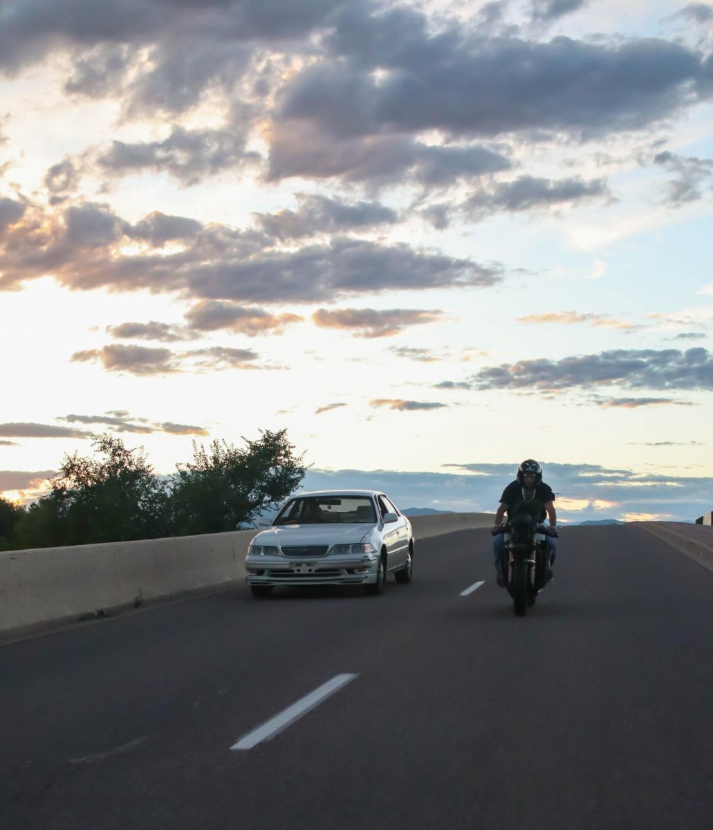 Pheng Vang in his 1997 Toyota mark II grande 2.5 (@project5280_markii) cruises along the highway with a motorcyclist. Sept. 17.
