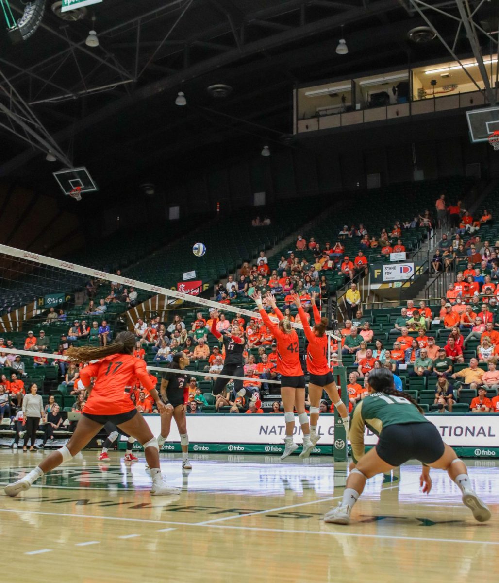 Colorado State University number 42, Karina Leber and number 1, Malaya Jones, go to block the ball coming from a University of Nevada, Las Vegas player. CSU won, 3-0. Sept. 30.