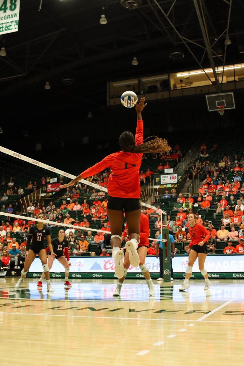 Colorado State University number 17, Kennedy Stanford hits the ball over the net at the volleyball game against the University of Las Vegas, Nevada. CSU won, 3-0. Sept. 30