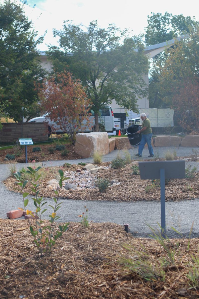 Colorado State University facilities management team work to add the finishing touches on the new Peace Corps tribute Garden located outside of the Lory Student Center, west of the theater. Oct. 2.