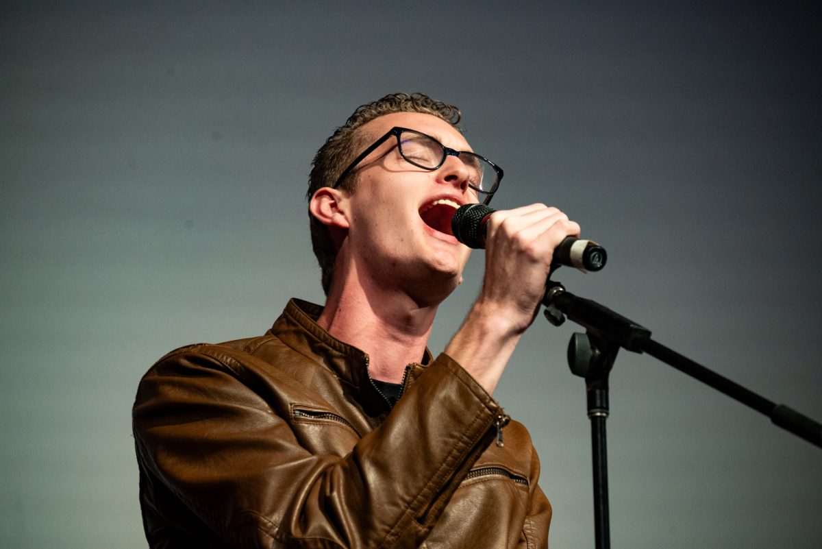 Performer Paul Cauchi sings one of the new songs he wrote at the TedxCSU event.