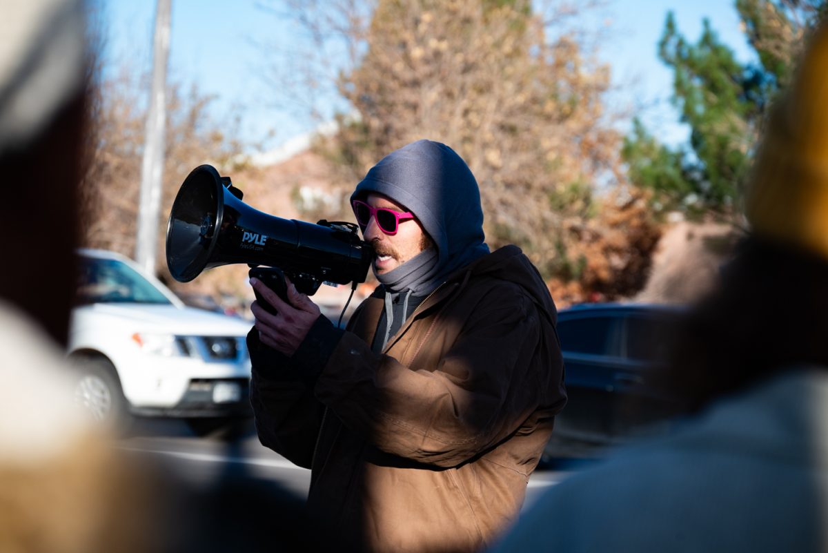 A protester speaks on his experience as a Palestinian-American during the "Die-In at Woodward" protest.