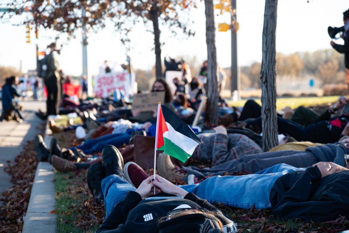 Protestors lay in silence for a ten-minute period during the "Die-In at Woodward" protest.