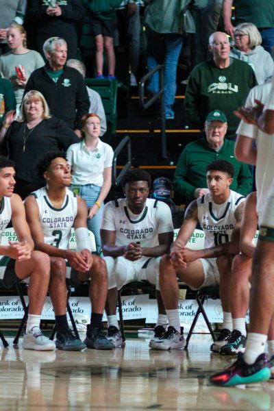 Colorado State University point guard Isaiah Stevens (4) sits on the bench with Joel Scott (1), Josiah Strong (3) and Nique Clifford (10) before the game Nov. 10.