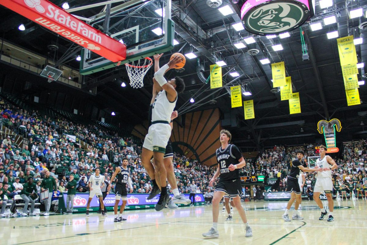 Josiah Strong (3), a Colorado State University guard, dunks the ball against Wright State University Nov. 10. The Rams beat WSU 105-77.