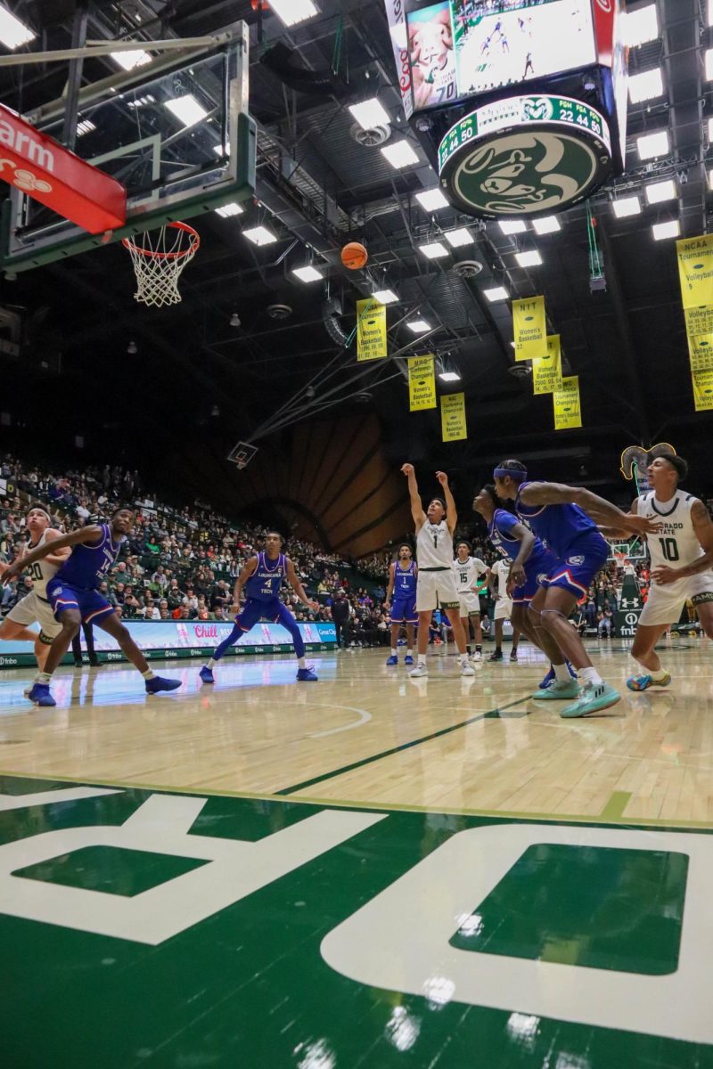 Colorado State University number 1, Joel Scott, shoots a free throw at the Men's basketball season opener against Louisiana Tech, CSU won 81-73.