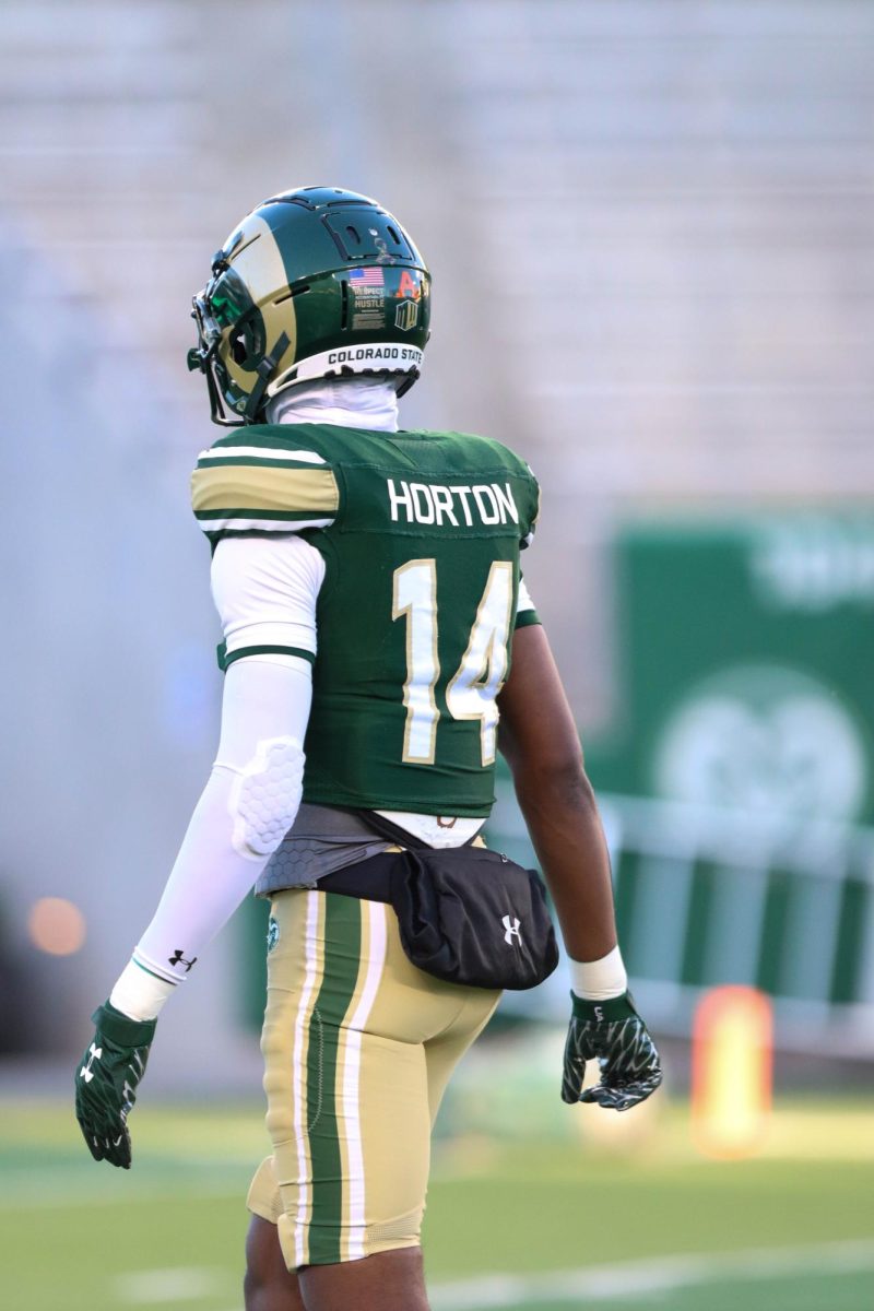 Colorado State University No.14, Tory Horton warms up on the Canvas stadium field at the military appreciation game against San Diego State University, CSU won 22-19.