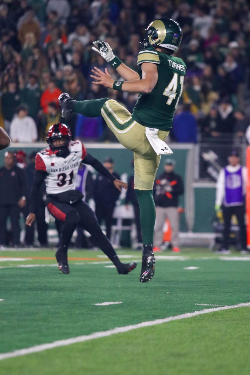 Colorado State University No.41 Paddy Turner punts the ball at the military appreciation game against San Diego State University, CSU won 22-19.