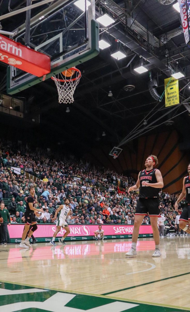 No. 13, Javonte Johnson makes a basket at the men's basketball game against Denver University, CSU won, 90-80.