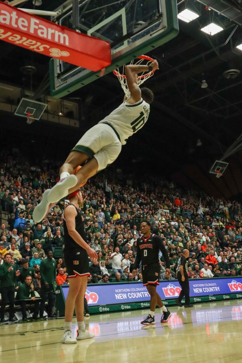 No. 10, Nique Clifford dunks on Denver University at the men's basketball game against Denver University, CSU won, 90-80.