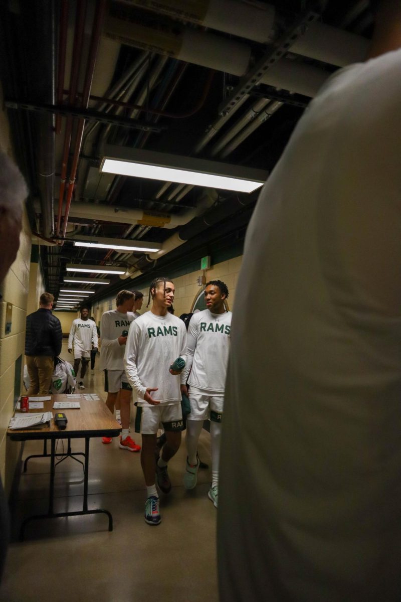 Colorado State University men's basketball team makes their way through the hallway before the game against Denver University, CSU won, 90-80.