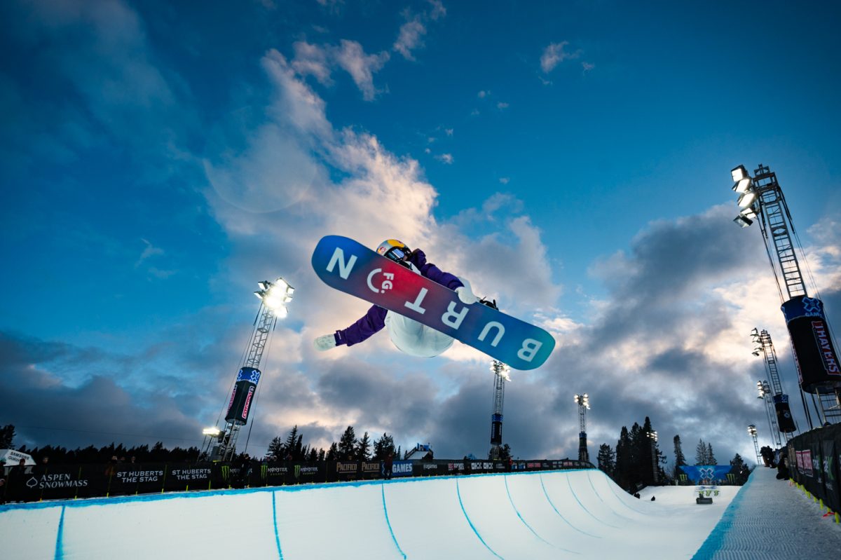 A snowboarder soars above the Monster Energy Mens Snowboard SuperPipe during X Games Aspen Jan. 26.