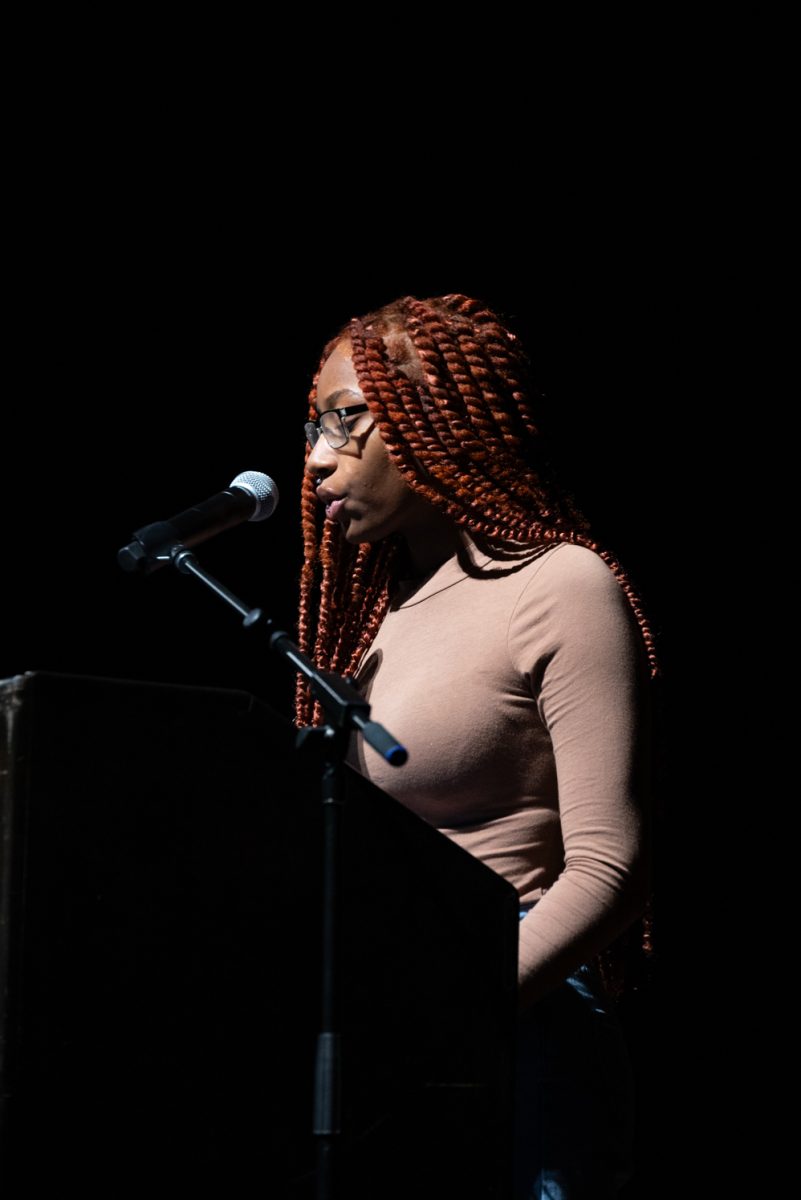 Kylynn White shares her written piece 'Asha and Her Hope' at the annual celebration of Martin Luther King Jr. Day.
