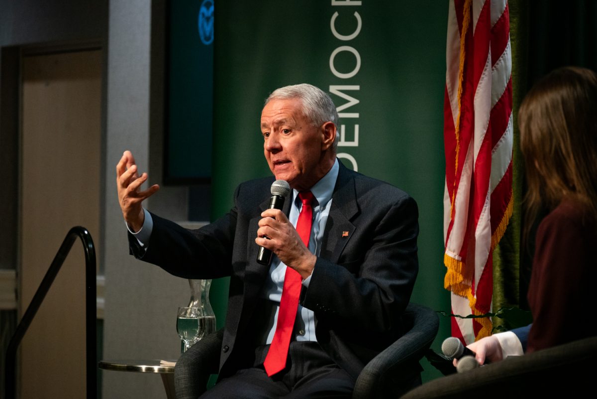 Representative Ken Buck discusses the problem of rising national debt at the Coffee with Ken Buck event in the University Ballroom.