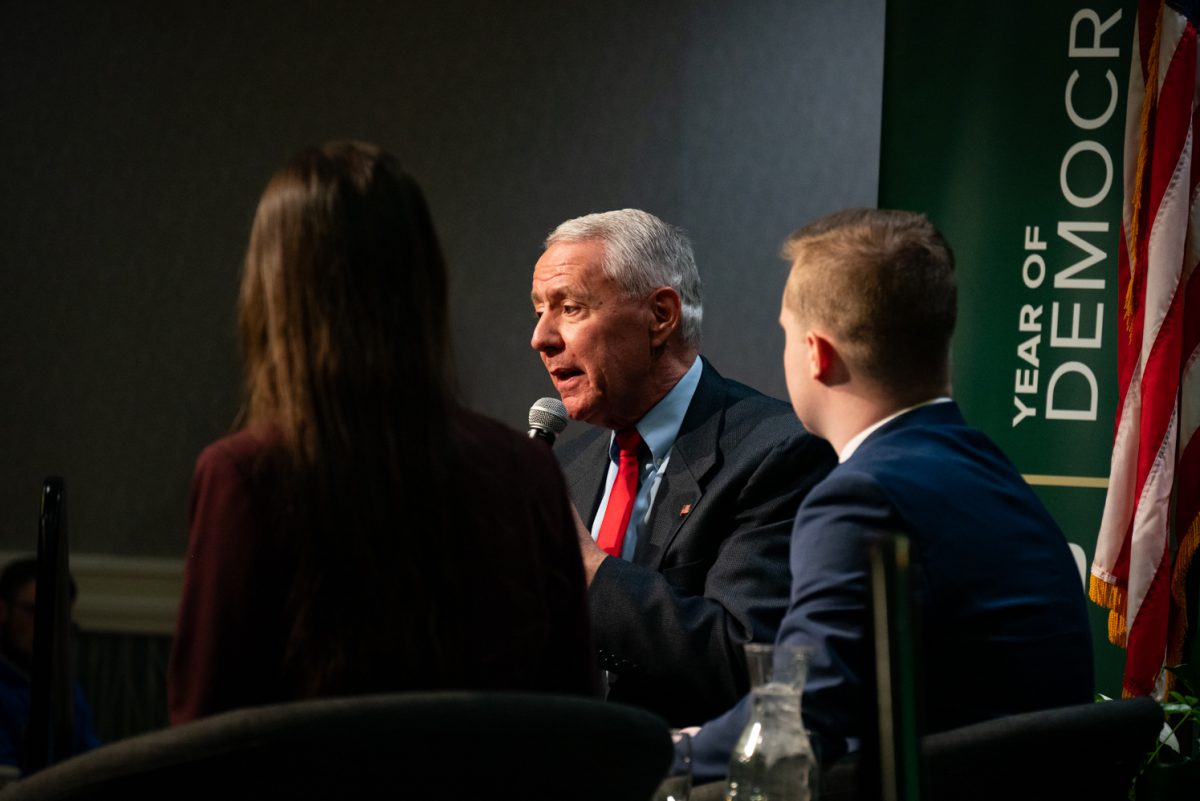 Representative Ken Buck discusses the problem of rising national debt at the Coffee with Ken Buck event in the University Ballroom.