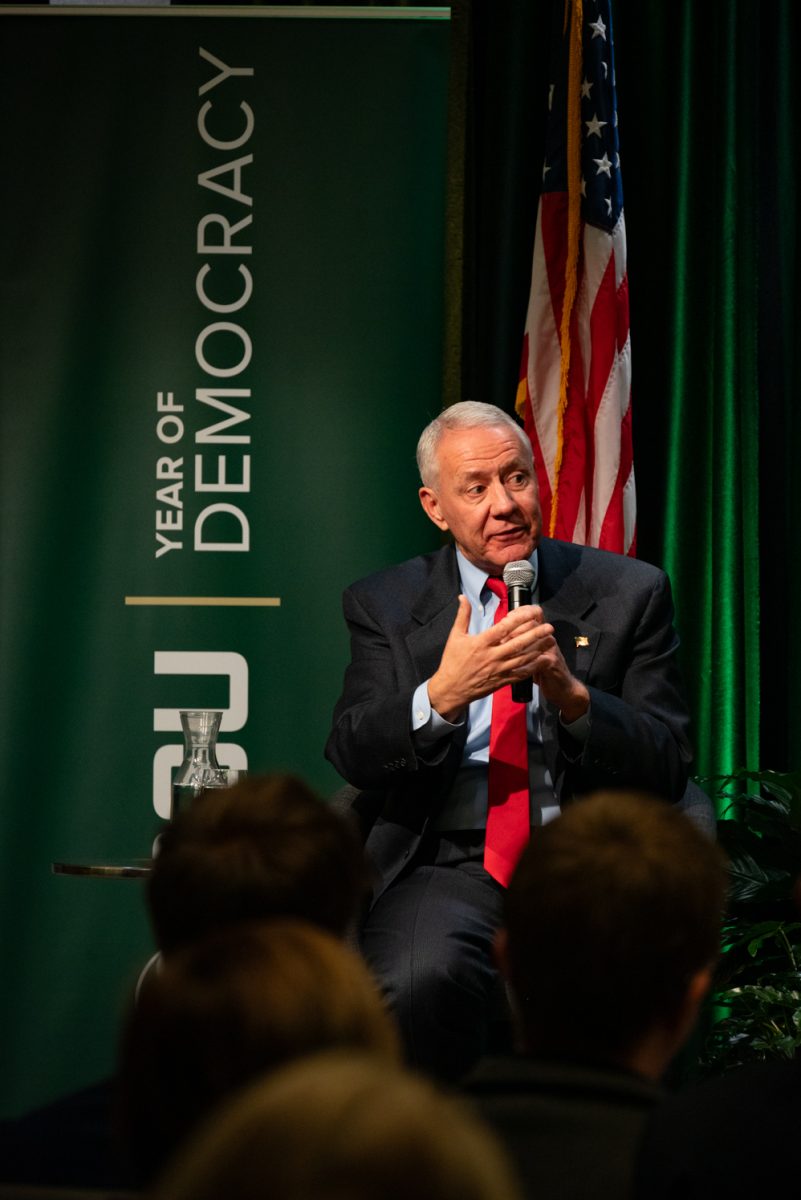 Representative Ken Buck speaks about understanding politics and how to navigate them at the Coffee with Ken Buck event in the University Ballroom.