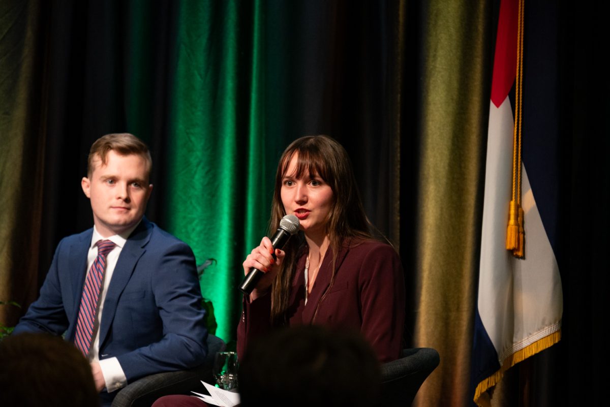Student moderator Amber Wright explains to the audience that her and the other student moderator, Jack Barrett, will be leading the discussion with questions asked by members of the CSU community.
